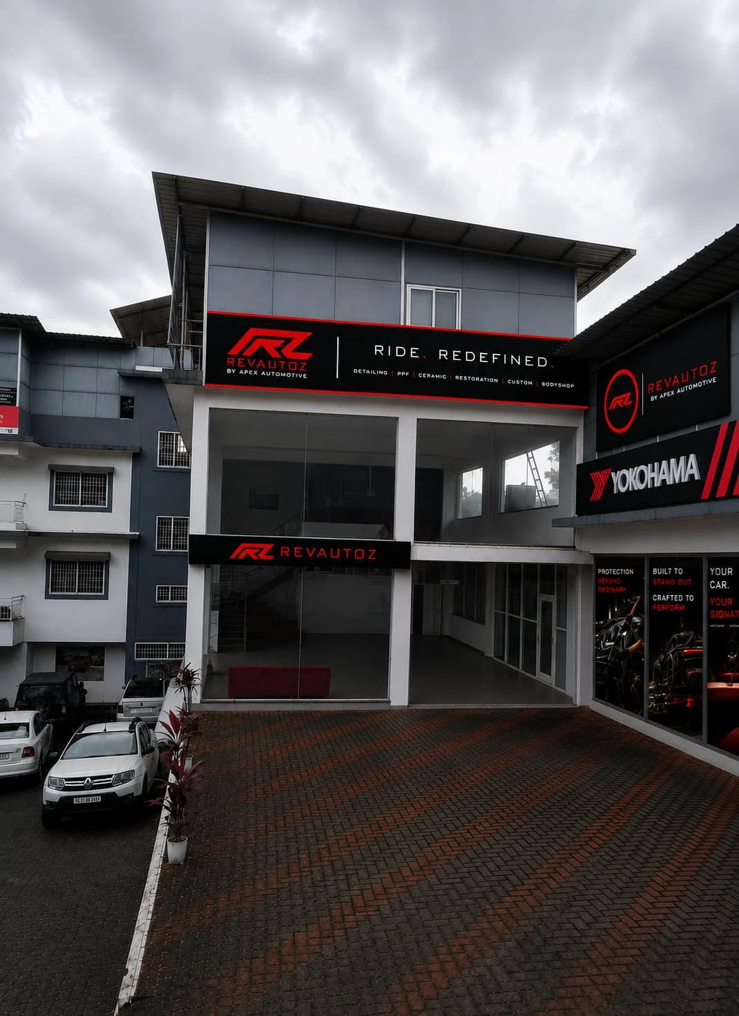 The Revautoz studio in Colvale, Mapusa, Goa — Ride. Redefined. signage above the entrance